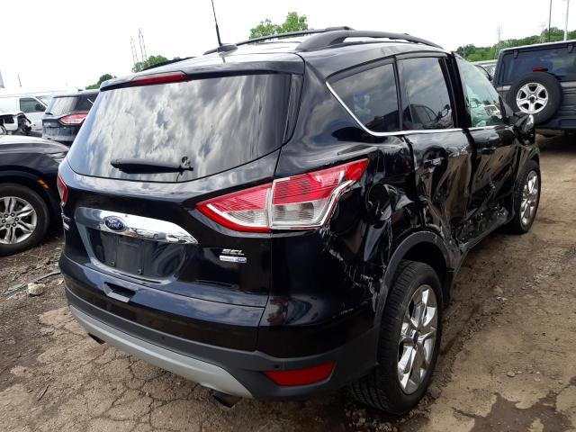 Photo 4 from auction – 2013 FORD ESCAPE SEL with VIN 1FMCU9HXXDUD52634