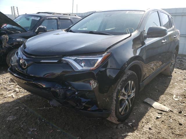 Photo 2 from auction – 2018 TOYOTA RAV4 LE with VIN 2T3BFREV7JW818435