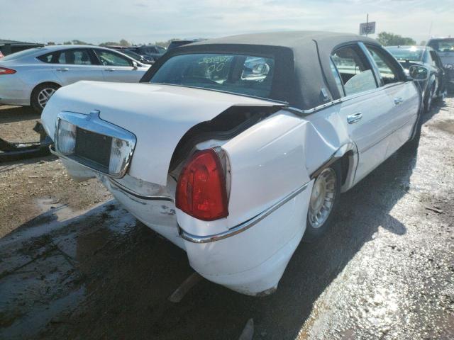 Photo 4 from auction – 2000 LINCOLN TOWN CAR E with VIN 1LNHM81W1YY870776
