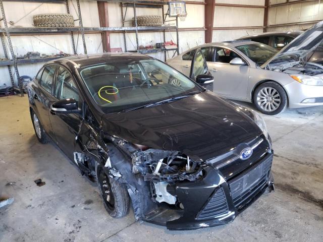 FORD FOCUS SE 2014 with VIN 1FADP3F26EL105581 - Photo from auction