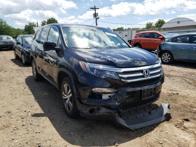 HONDA PILOT EXL 2017 with VIN 5FNYF6H51HB003801 - Photo from auction
