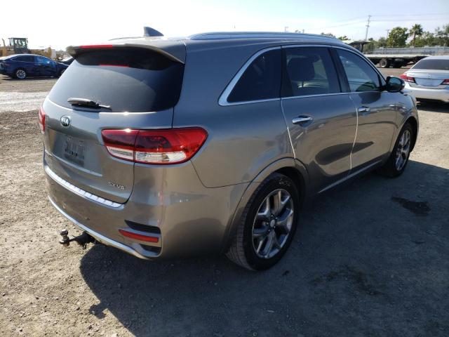 Photo 4 from auction – 2016 KIA SORENTO SX with VIN 5XYPK4A58GG084616
