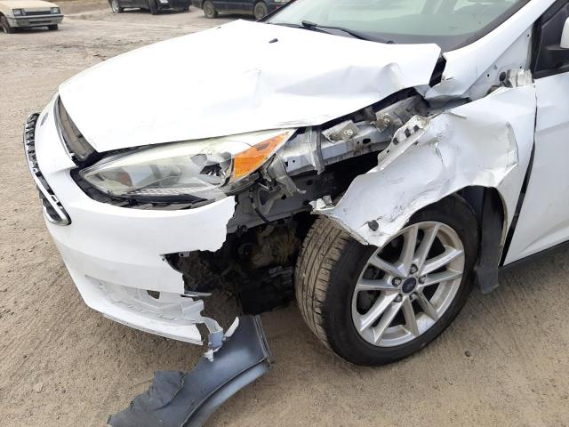 Photo 9 from auction – 2015 FORD FOCUS SE with VIN 1FADP3F2XFL203515