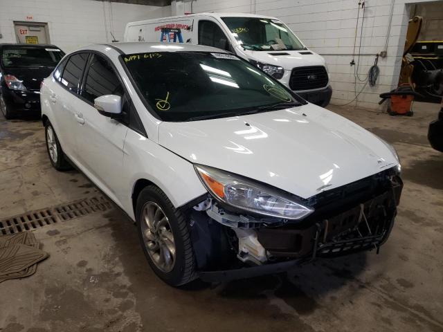 FORD FOCUS SE 2015 with VIN 1FADP3F29FL375034 - Photo from auction
