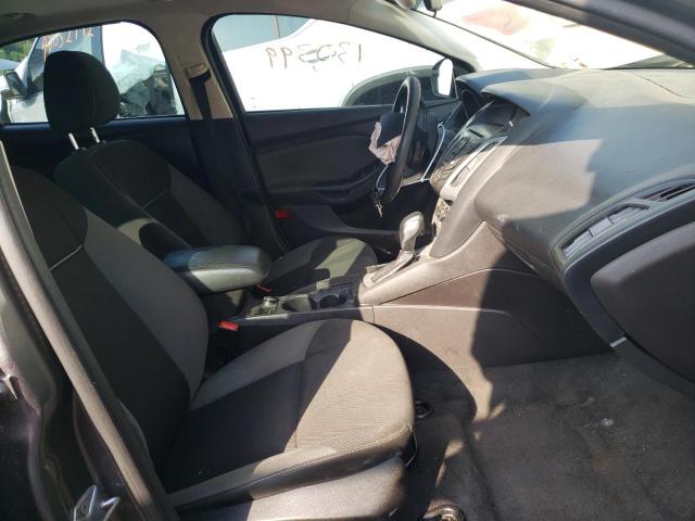 Foto 5 de la subasta – 2014 FORD FOCUS SE con VIN 1FADP3K28EL157428