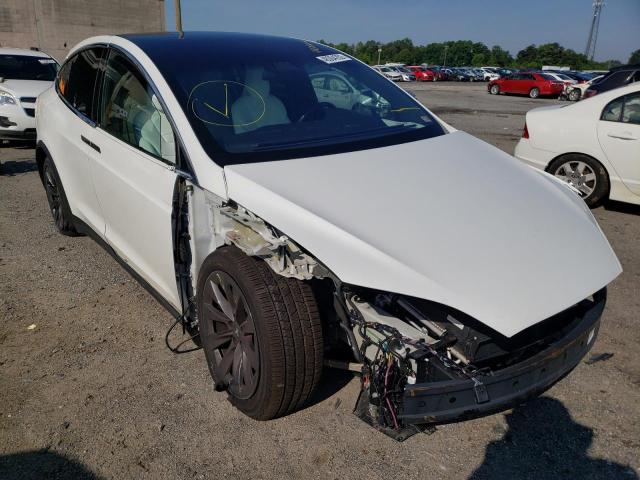 TESLA MODEL X 2017 with VIN 5YJXCDE29HF059665 - Photo from auction
