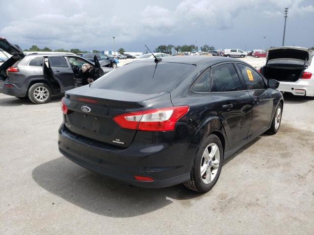 Photo 4 from auction – 2014 FORD FOCUS SE with VIN 1FADP3F23EL426638
