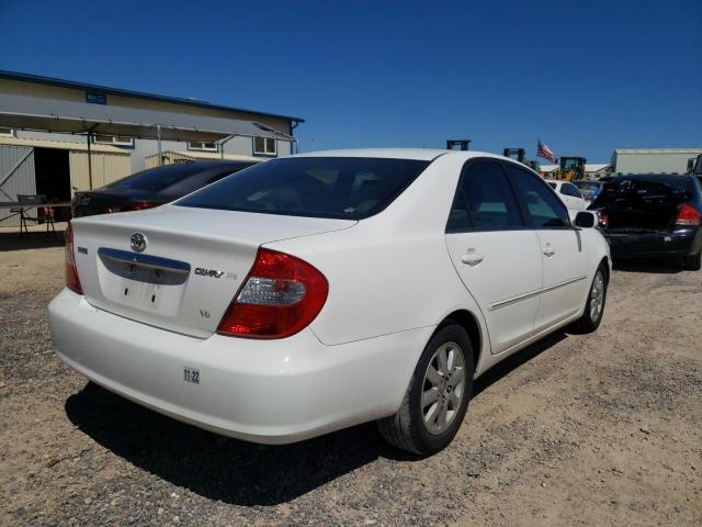 Photo 4 from auction – 2004 TOYOTA CAMRY LE with VIN JTDBF30K640154664