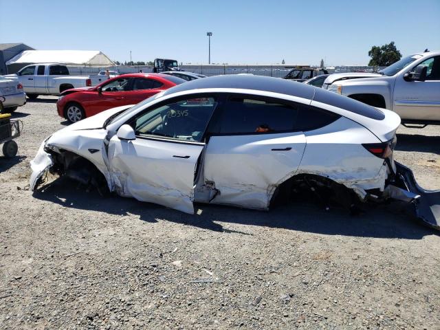 Photo 9 from auction – 2021 TESLA MODEL Y with VIN 5YJYGDEEXMF304969