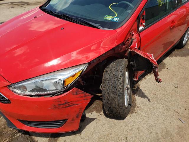 Photo 9 from auction – 2016 FORD FOCUS SE with VIN 1FADP3F25GL214052