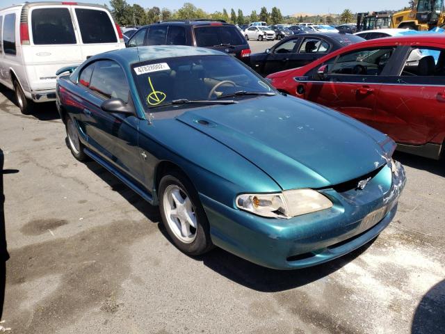 FORD MUSTANG 1998 with VIN 1FAFP404XWF266198 - Photo from auction
