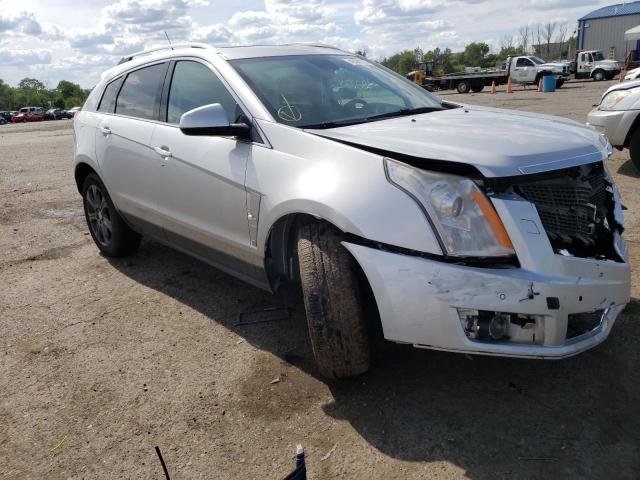 CADILLAC SRX PERFOR 2012 with VIN 3GYFNEE37CS597098 - Photo from auction