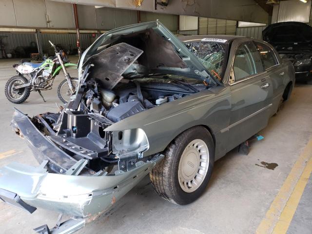 Photo 2 from auction – 2004 LINCOLN TOWN CAR E with VIN 1LNHM81W84Y617612