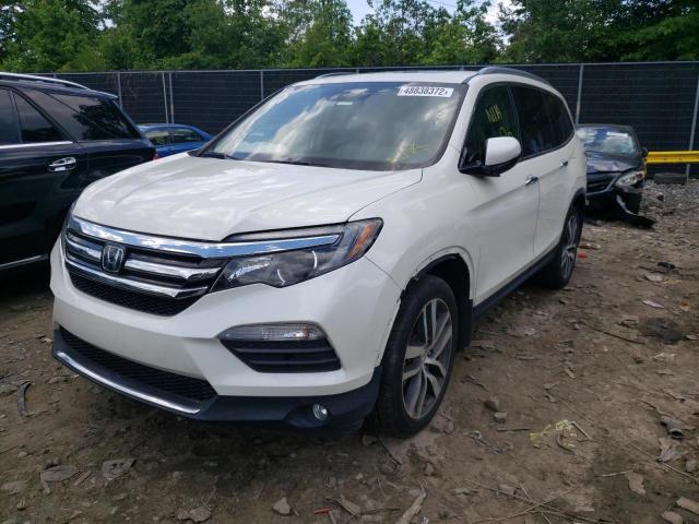 Photo 2 from auction – 2016 HONDA PILOT TOUR with VIN 5FNYF5H98GB032739