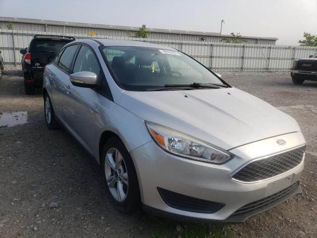 FORD FOCUS SE 2015 with VIN 1FADP3F21FL227380 - Photo from auction