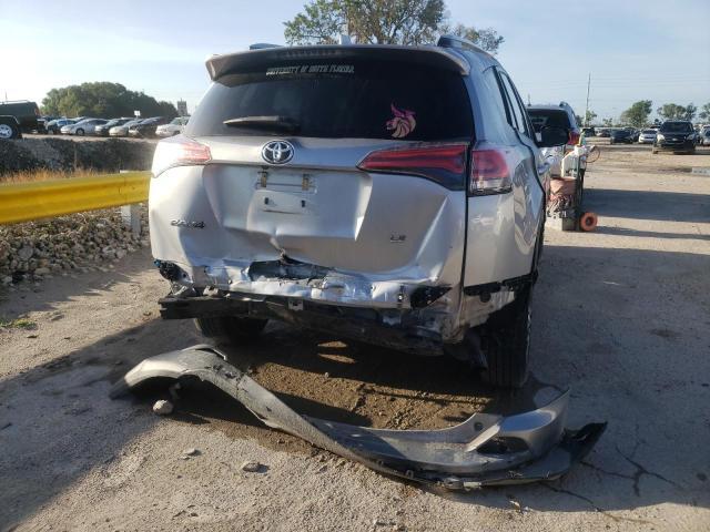 Photo 9 from auction – 2018 TOYOTA RAV4 LE with VIN 2T3ZFREV2JW523113