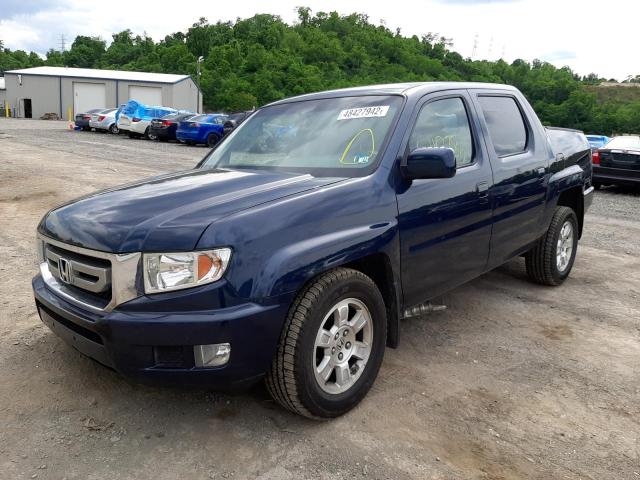 Photo 2 from auction – 2011 HONDA RIDGELINE with VIN 5FPYK1F45BB455385