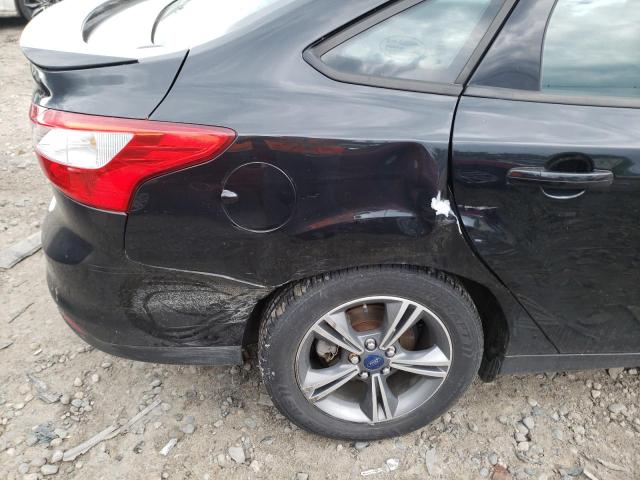 Photo 9 from auction – 2014 FORD FOCUS SE with VIN 1FADP3F28EL459859