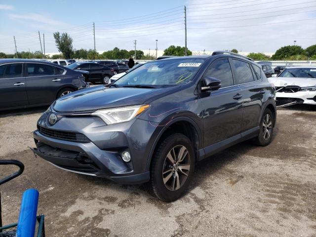 Photo 2 from auction – 2017 TOYOTA RAV4 XLE with VIN JTMWFREV5HD097962