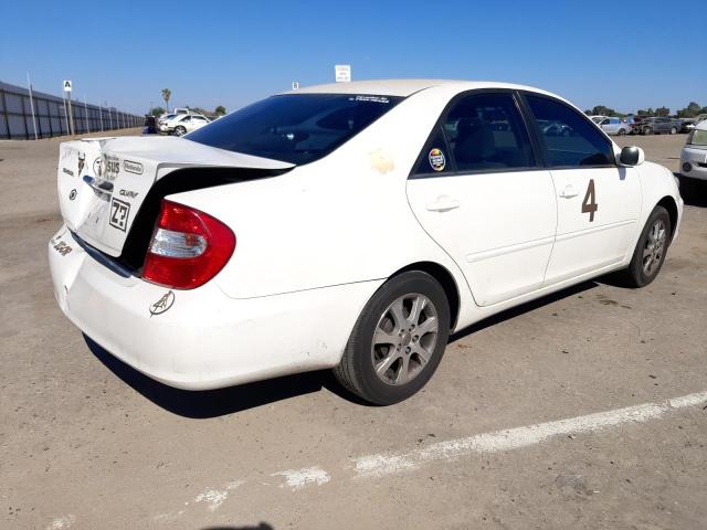 Photo 4 from auction – 2004 TOYOTA CAMRY LE with VIN JTDBE32K640283181