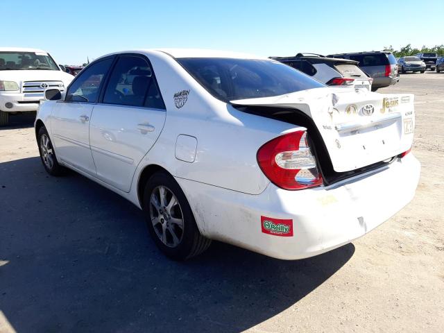 Photo 3 from auction – 2004 TOYOTA CAMRY LE with VIN JTDBE32K640283181