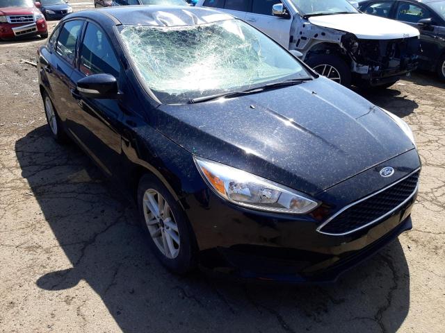 FORD FOCUS SE 2017 with VIN 1FADP3F21HL209934 - Photo from auction