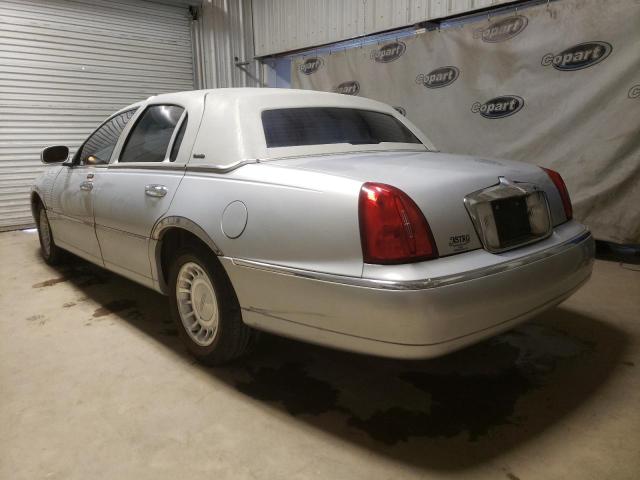 Photo 3 from auction – 2002 LINCOLN TOWN CAR E with VIN 1LNHM81W62Y662111