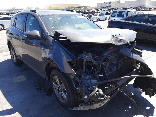 Photo 1 from auction – 2015 TOYOTA RAV4 XLE with VIN 2T3WFREV8FW173299