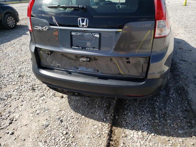 Photo 9 from auction – 2014 HONDA CR-V LX with VIN 3CZRM3H32EG711689