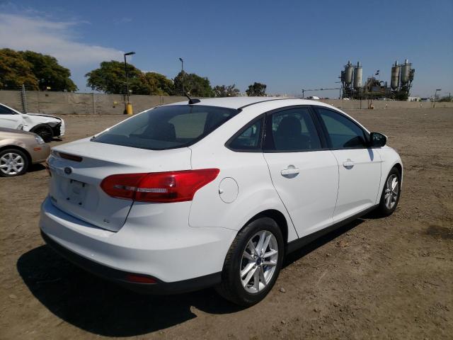 Photo 4 from auction – 2016 FORD FOCUS SE with VIN 1FADP3F28GL294334