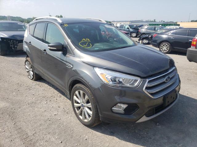 FORD ESCAPE TIT 2017 with VIN 1FMCU9JD1HUE85594 - Photo from auction