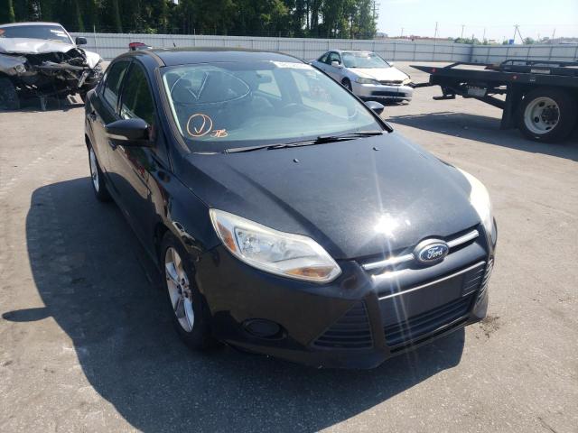 FORD FOCUS SE 2014 with VIN 1FADP3F24EL282386 - Photo from auction