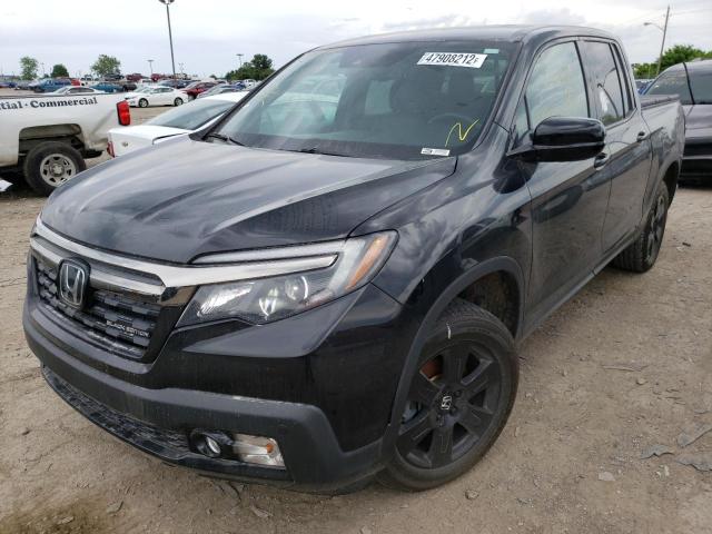 Photo 2 from auction – 2020 HONDA RIDGELINE with VIN 5FPYK3F83LB013608