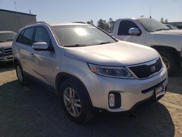 KIA SORENTO LX 2015 with VIN 5XYKTCA64FG562751 - Photo from auction