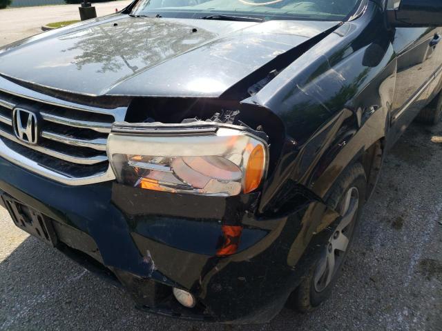 Photo 9 from auction – 2014 HONDA PILOT TOUR with VIN 5FNYF4H98EB009100