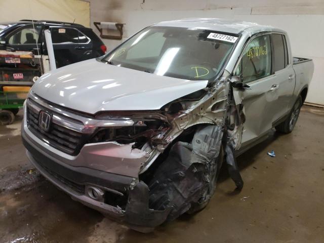 Photo 2 from auction – 2020 HONDA RIDGELINE with VIN 5FPYK3F79LB002703