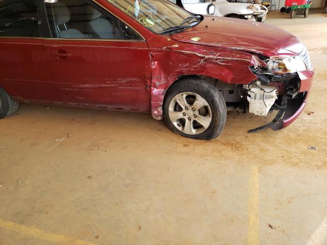 Photo 9 from auction – 2009 KIA OPTIMA LX with VIN KNAGE228295319279