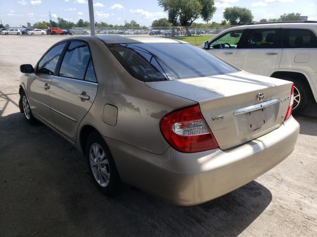 Photo 3 from auction – 2004 TOYOTA CAMRY LE with VIN 4T1BF32K74U571809