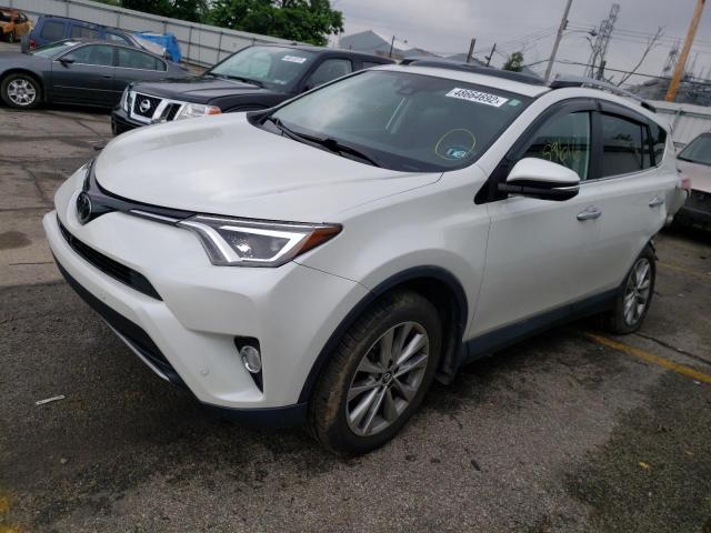 Photo 2 from auction – 2017 TOYOTA RAV4 LIMIT with VIN 2T3DFREV1HW548203