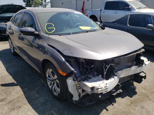 HONDA CIVIC LX 2018 with VIN 2HGFC2F57JH528679 - Photo from auction