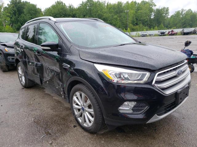 FORD ESCAPE TIT 2017 with VIN 1FMCU0JD3HUB58061 - Photo from auction