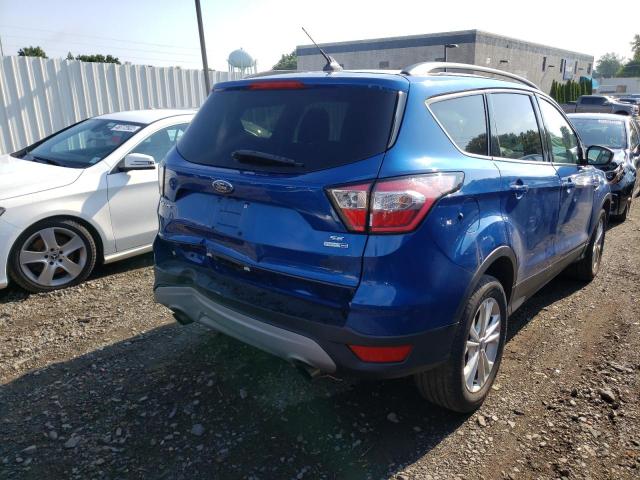 Photo 4 from auction – 2018 FORD ESCAPE SE with VIN 1FMCU9GD1JUC01149