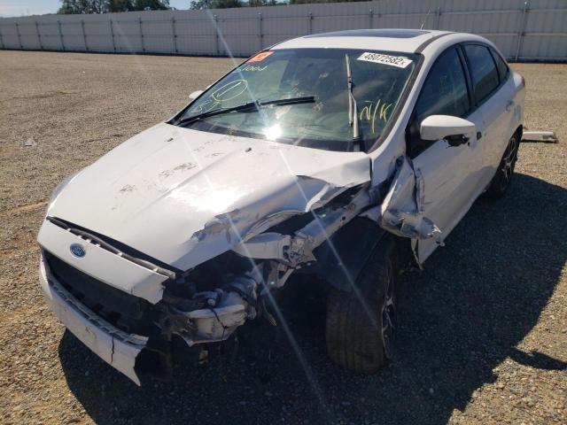 Photo 2 from auction – 2015 FORD FOCUS SE with VIN 1FADP3F28FL315097