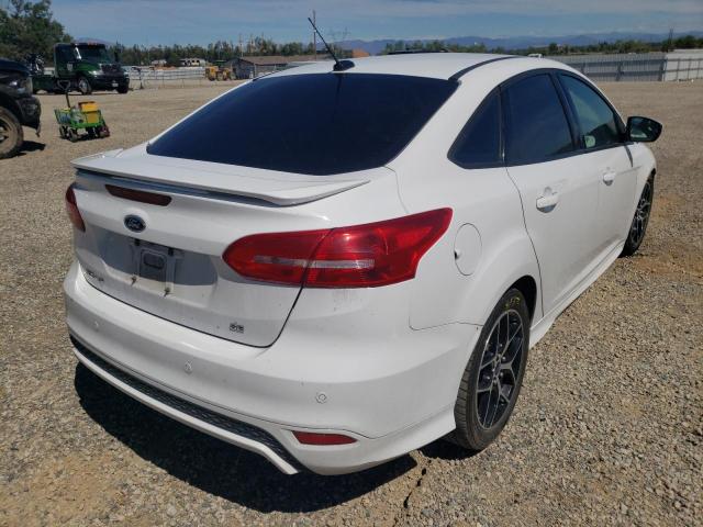 Photo 4 from auction – 2015 FORD FOCUS SE with VIN 1FADP3F28FL315097