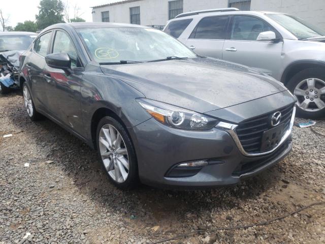 MAZDA 3 TOURING 2017 with VIN 3MZBN1V70HM128587 - Photo from auction