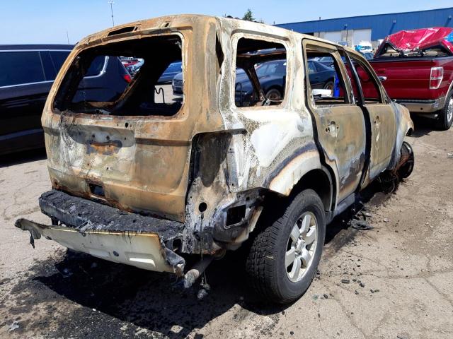 Photo 4 from auction – 2011 FORD ESCAPE LIM with VIN 1FMCU9E76BKA55101