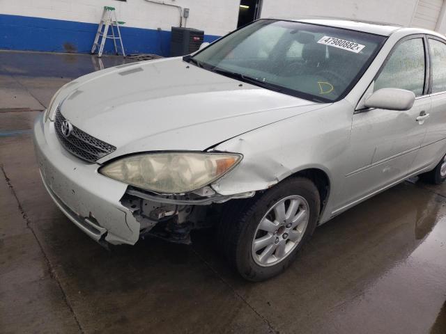 Photo 9 from auction – 2002 TOYOTA CAMRY LE with VIN JTDBE30K920057619
