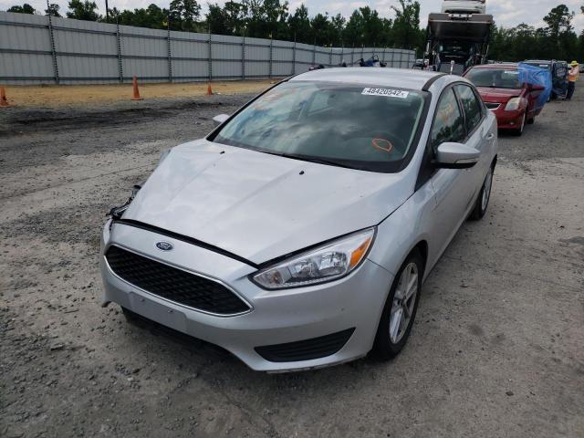 Photo 2 from auction – 2018 FORD FOCUS SE with VIN 1FADP3F22JL214968