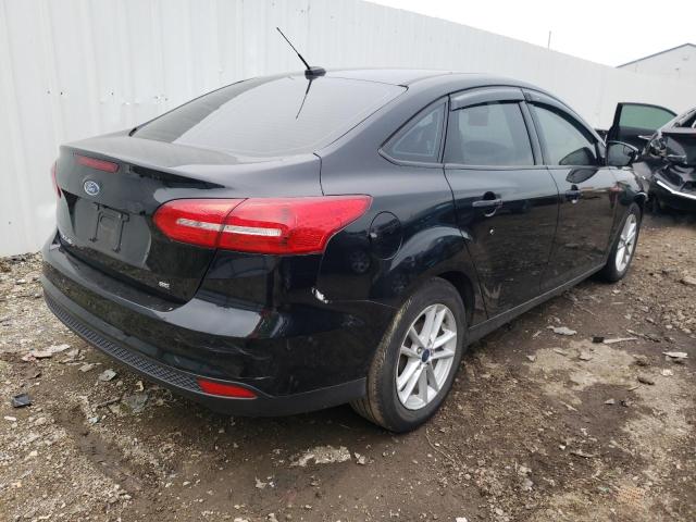 Photo 4 from auction – 2017 FORD FOCUS SE with VIN 1FADP3F23HL269942