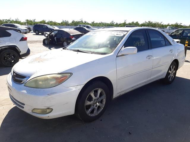 Photo 2 from auction – 2004 TOYOTA CAMRY LE with VIN JTDBE32K640283181